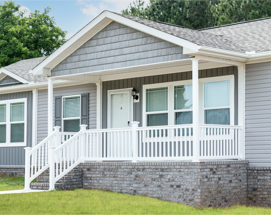 Exterior of house with porch.