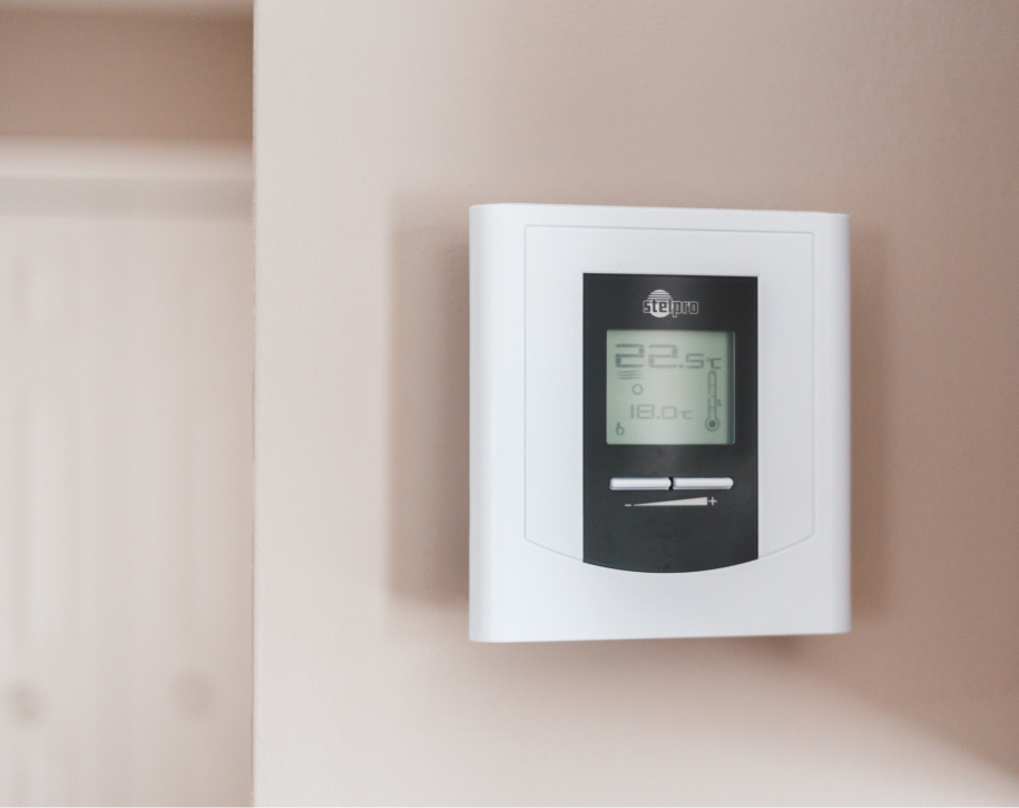 Thermostat on the wall.